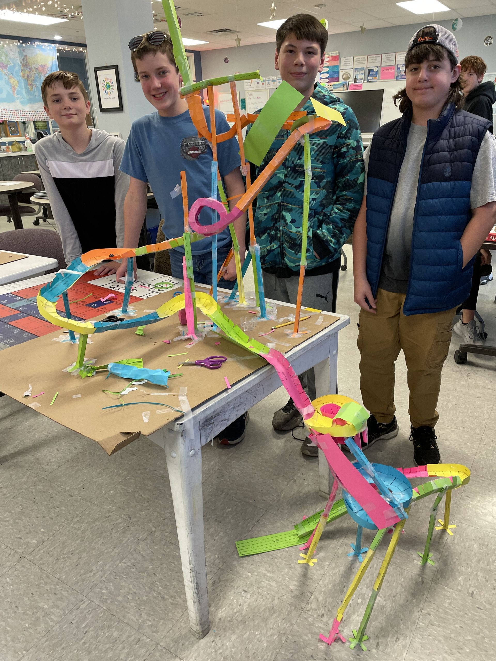 Montessori students working on a stem project