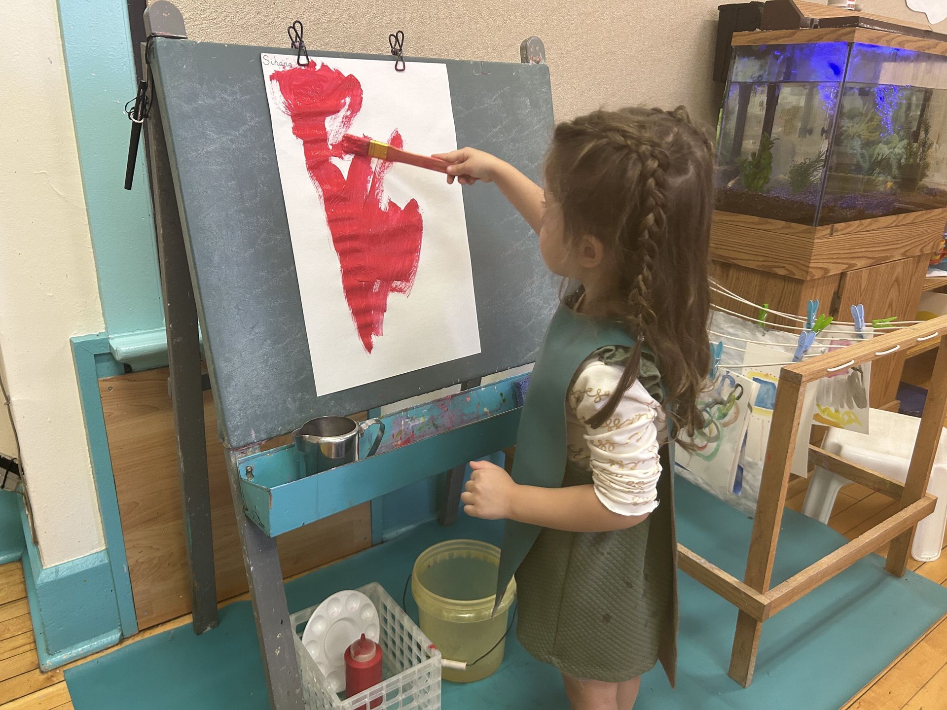 Child working with Montessori art activity
