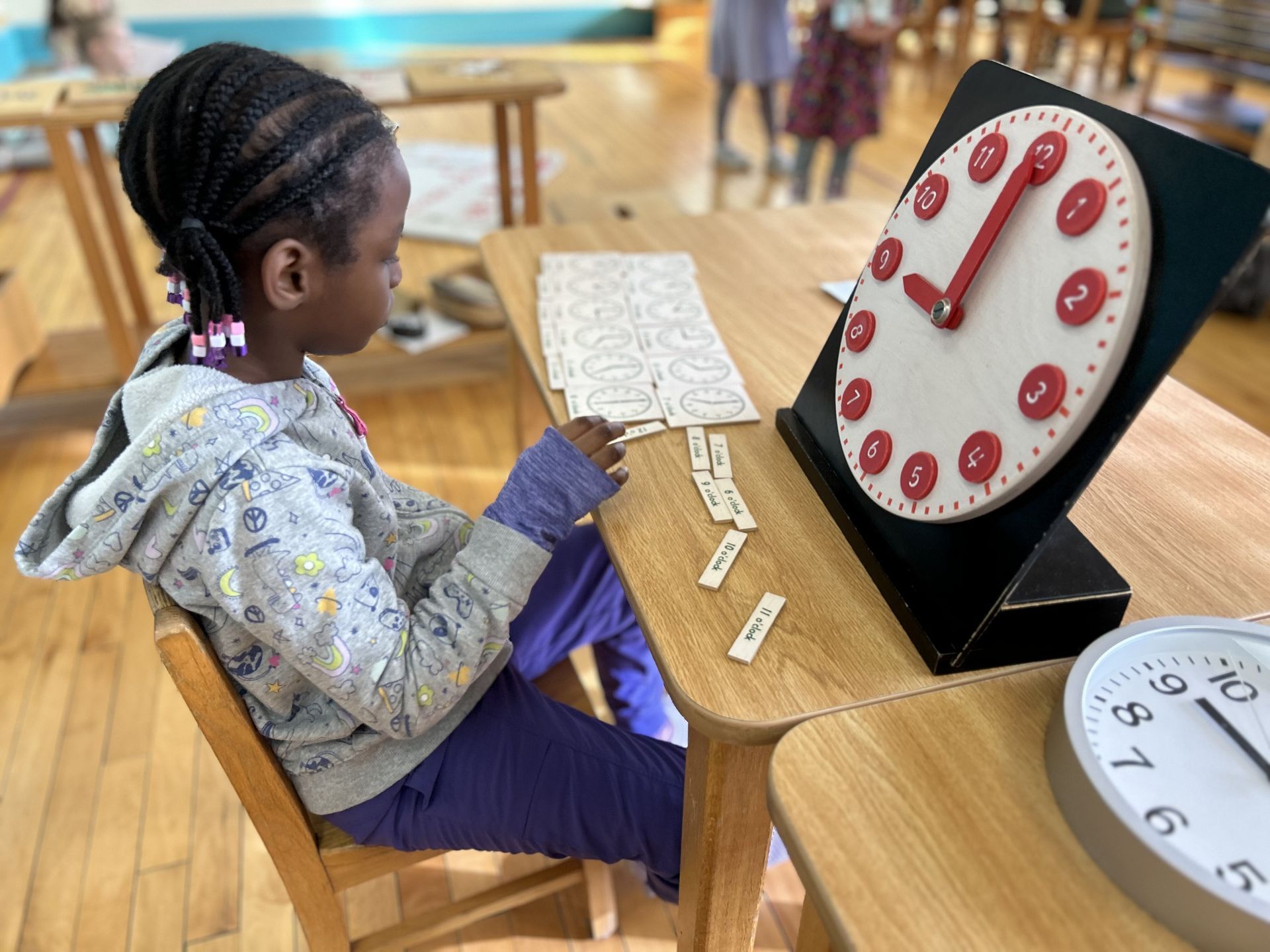 montessori child working with the pink tower
