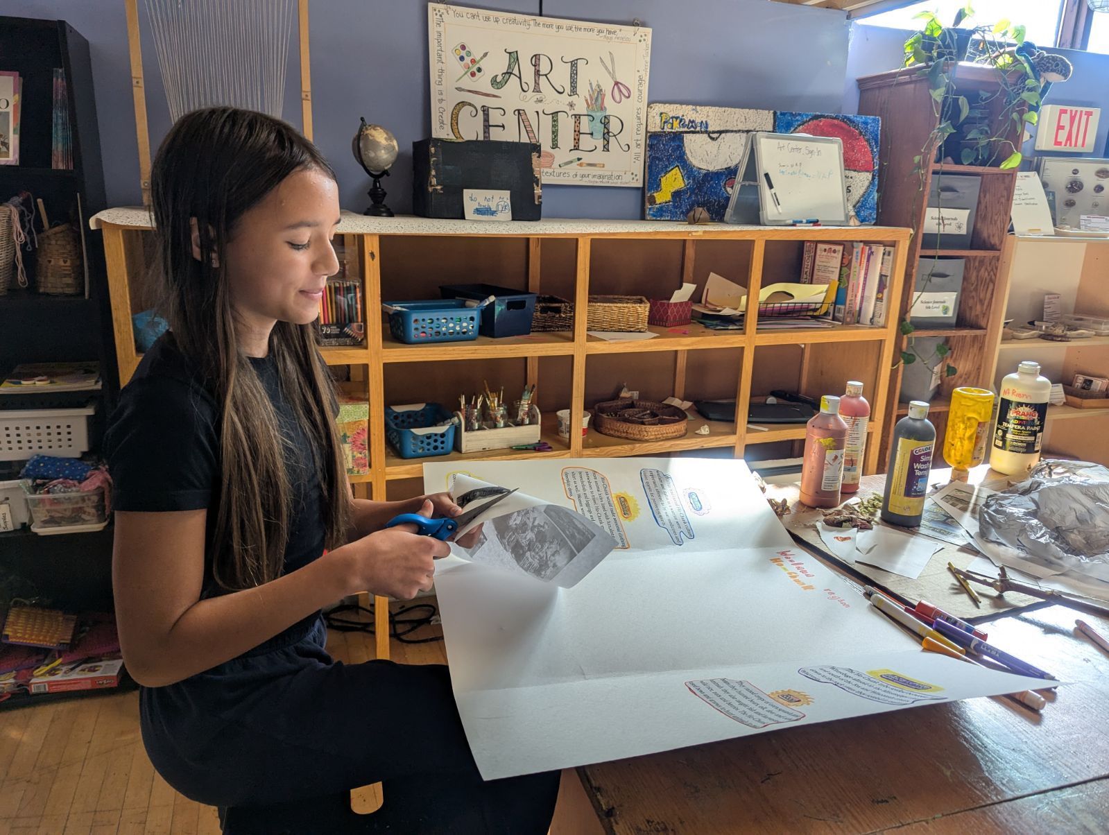 montessori child working with craft activity