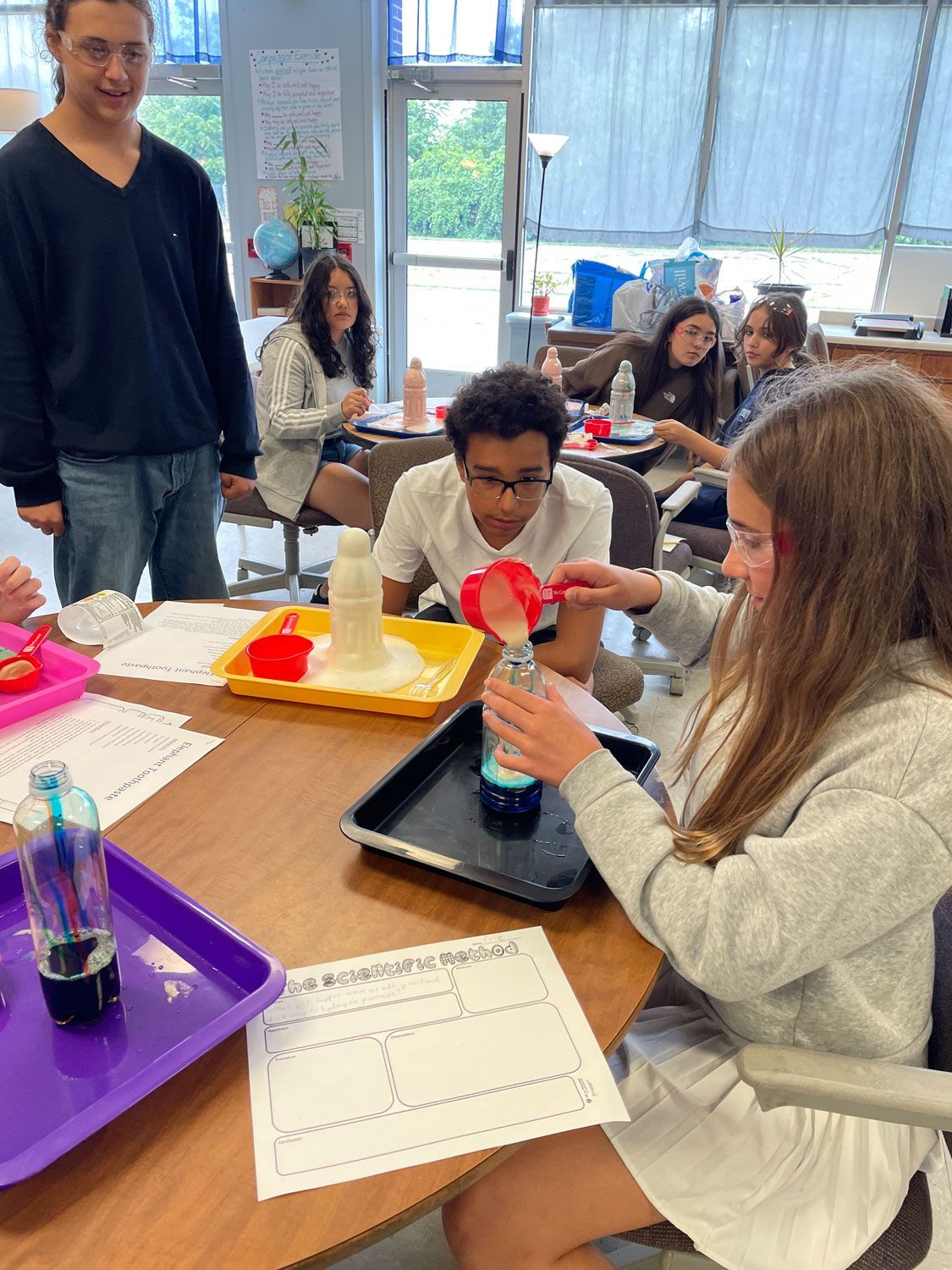 montessori adolescent working on an art project