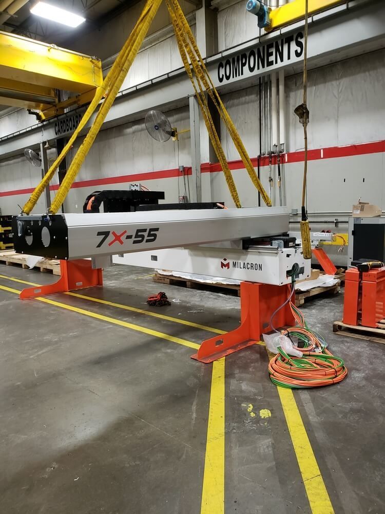 A large, industrial machine labeled 