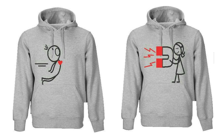 Dos sudaderas grises iguales. Una muestra un monigote siendo estirado, la otra un monigote sosteniendo un imán rojo.