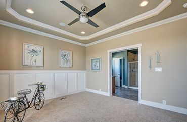 Bike on Living Room with Paintings Around — Visalia, CA — Kerman Mobile Homes Inc.