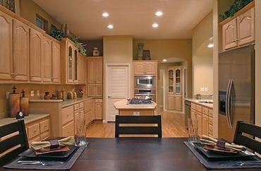 Kitchen Surrounded by Cabinets — Visalia, CA — Kerman Mobile Homes Inc.