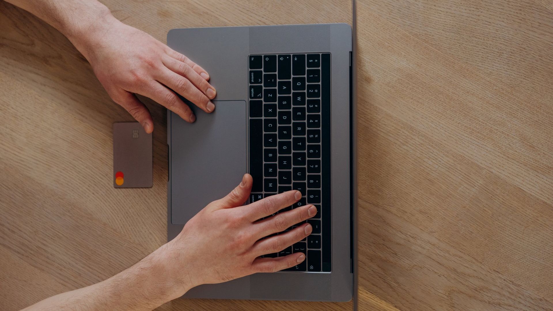 Browsing on computer while holding a credit card