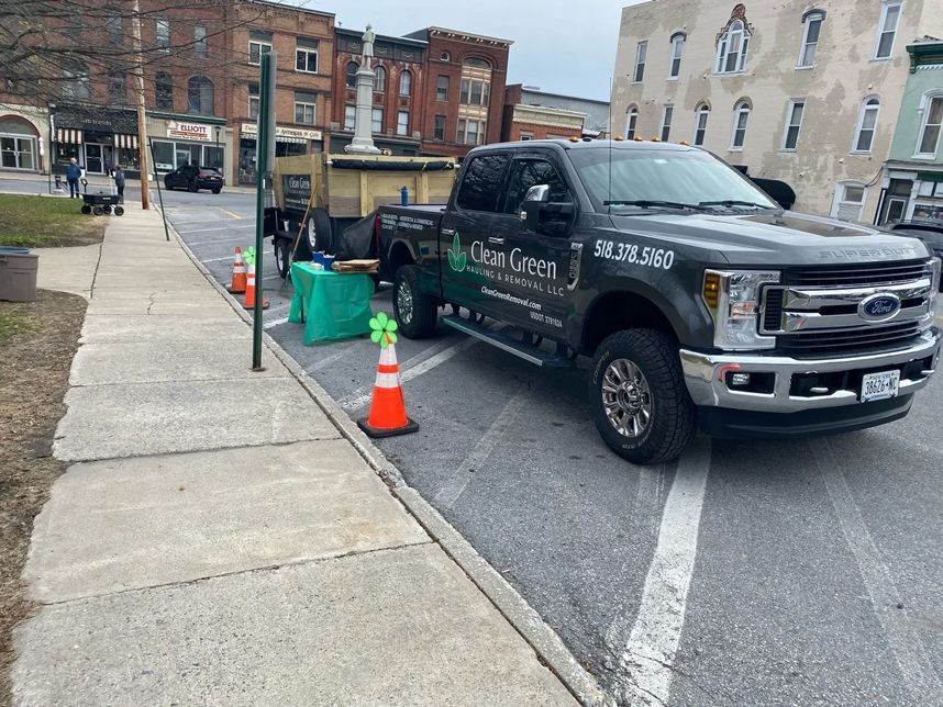 Truck and dump trailer parked downtown Ballston Spa