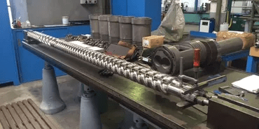 Industrial Screw And Barrel being repaired