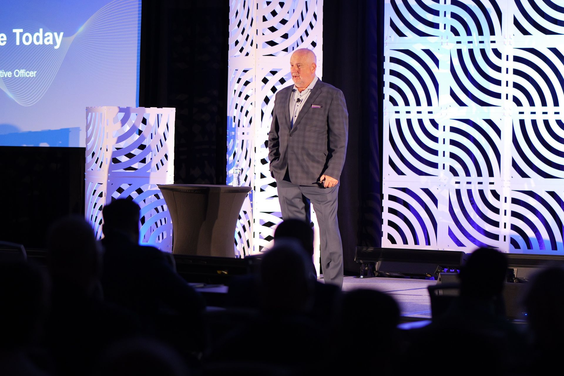 Mike Robinson, CEO of Mitel, is on stage at the Mitel Executive Partner Summit.