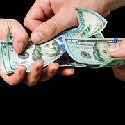 Hand Holding Cash — Columbus, OH — AA Cash 4 Junk Cars