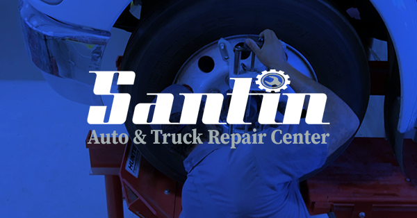 Santin Auto & Truck Repair Center logo over a mechanic working on a truck tire; blue background.