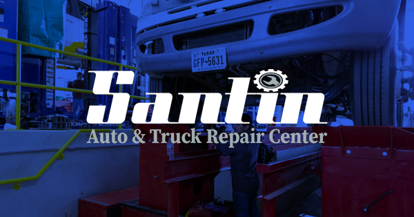 Santin Auto & Truck Repair Center logo over truck repair in a shop.