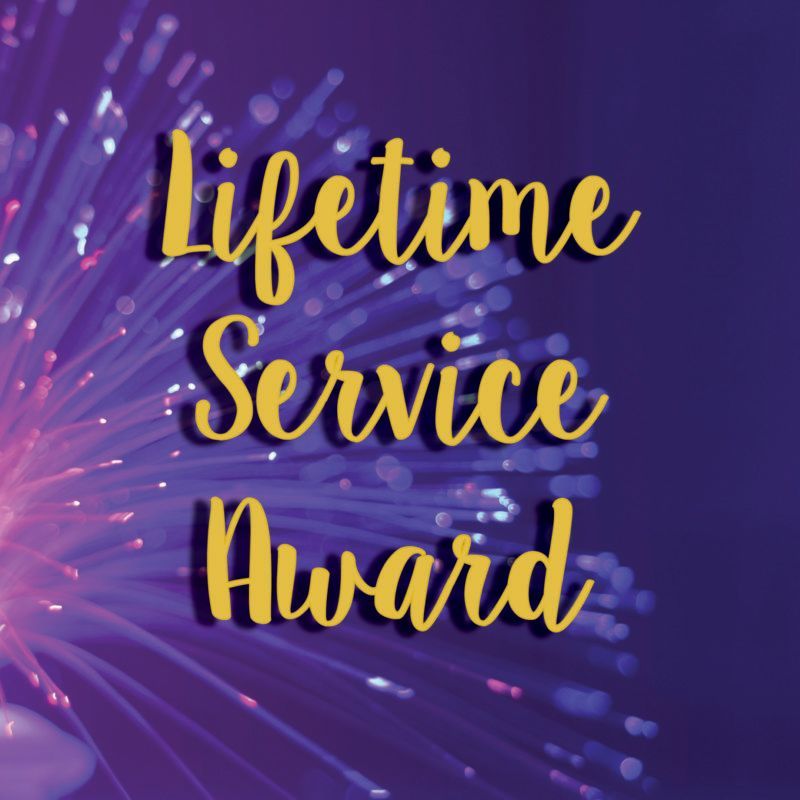Golden “Lifetime Service Award” text on a purple background with sparkling light streaks