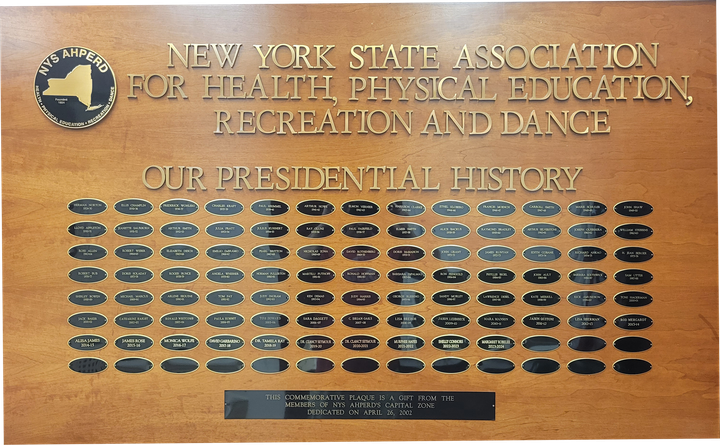 Plaque reading “New York State Association for Health, Physical Education, Recreation and Dance” with many engraved names and photos
