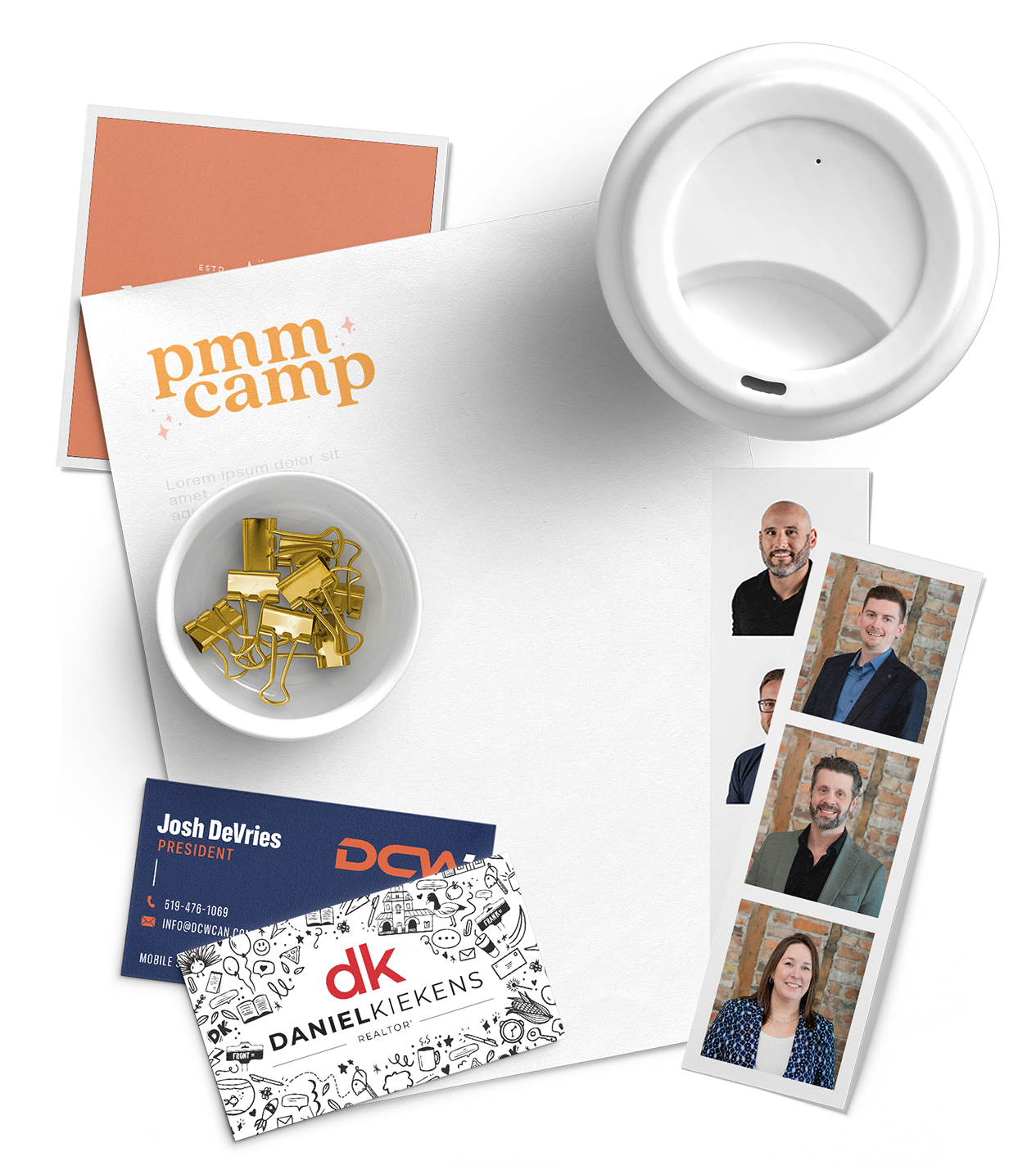 A table with a cup of coffee , a bowl of gold clips , a business card , and a letterhead.