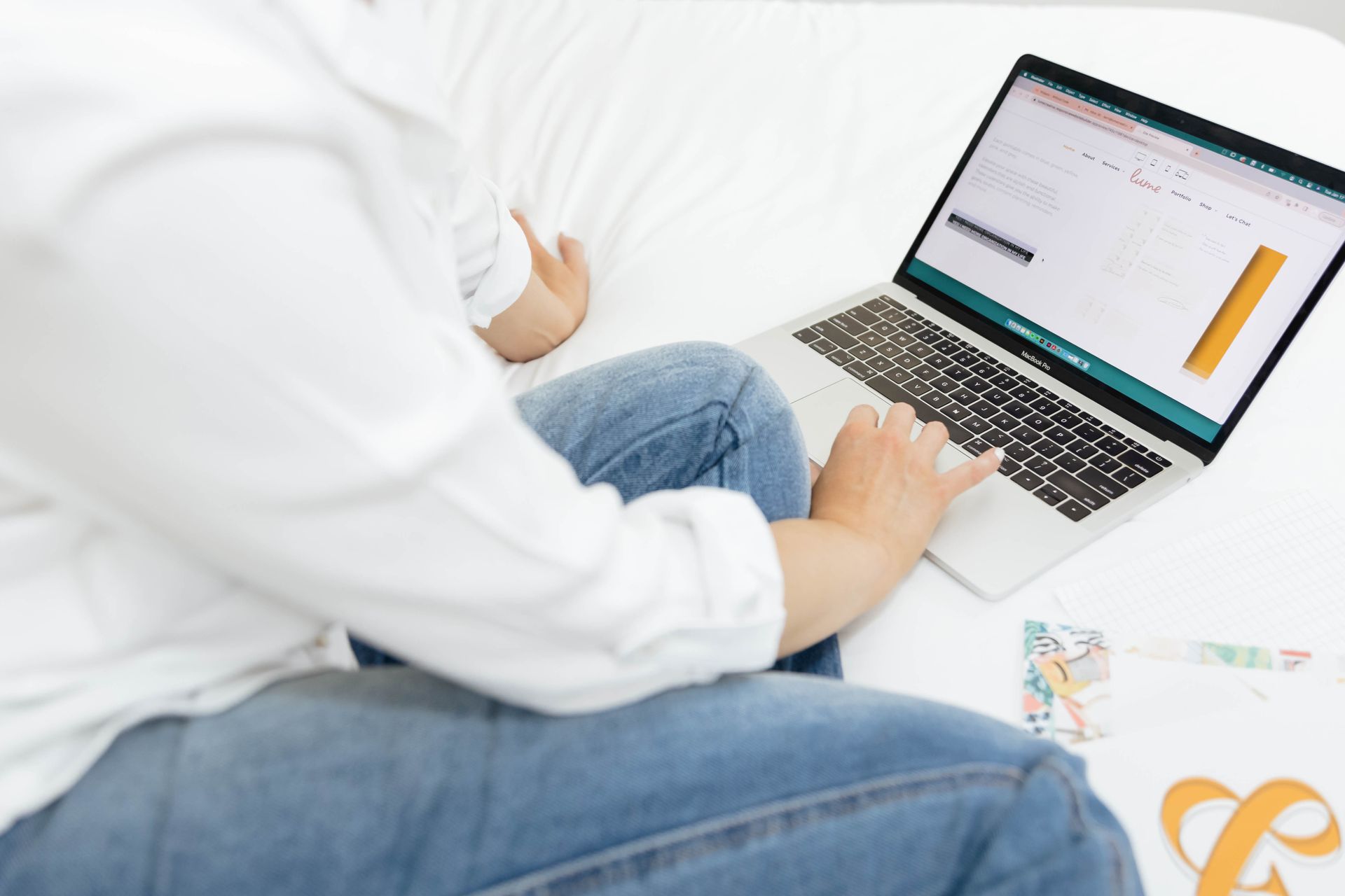 Outdated website design on a laptop screen compared to a modern website redesign by Lume, Ontario