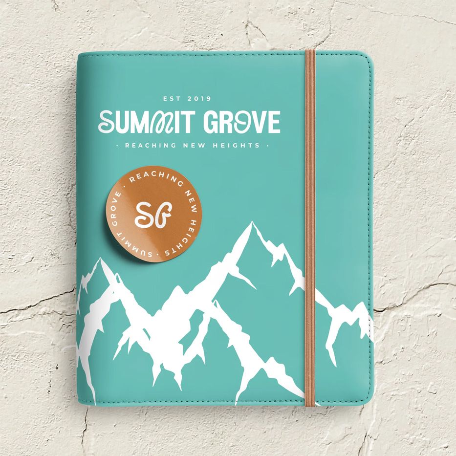 Turquoise journal with sticker.