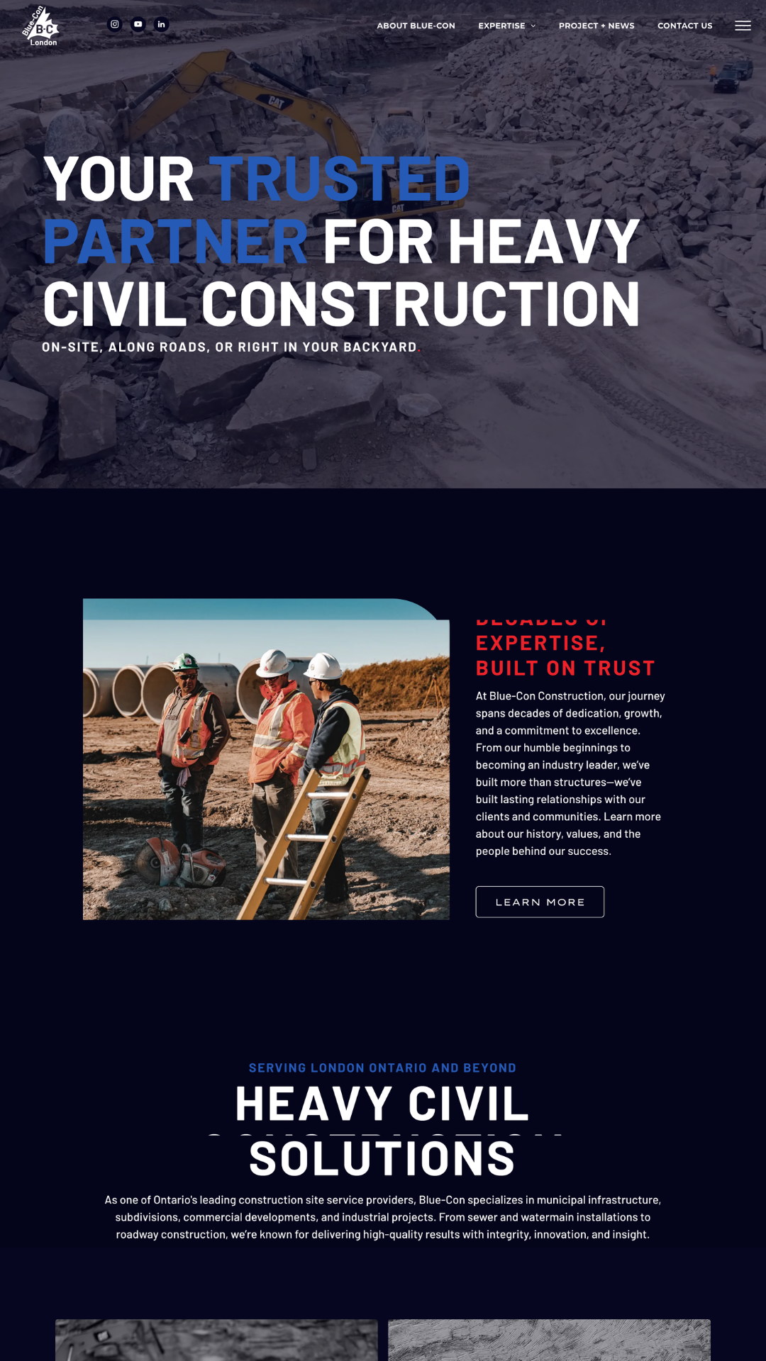 Blue-Con Construction homepage showing heavy civil construction services and job site photography