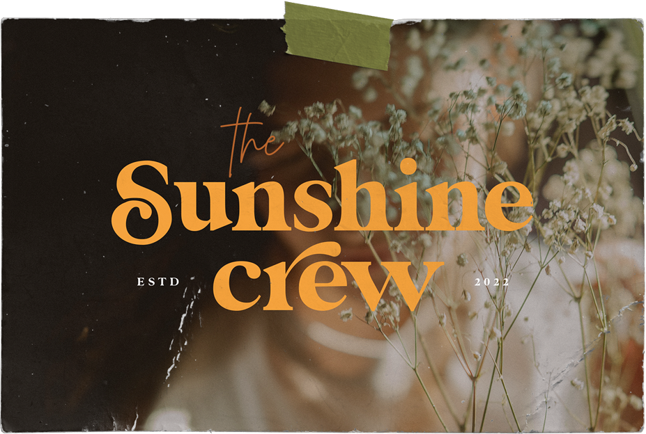 A poster for the sunshine crew with flowers in the background.