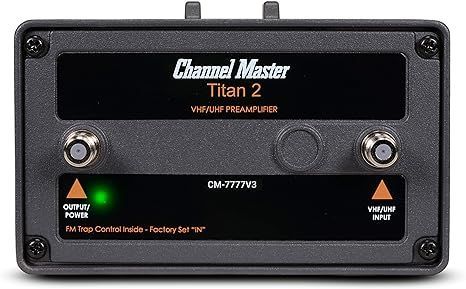 Channel Master Titan 2 preamplifier. Black, rectangular box with input/output connectors, power light, and text labels.