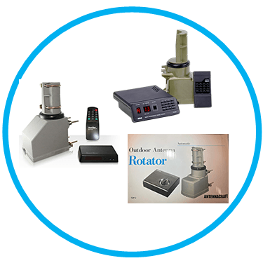 Antenna rotators and controller with remotes, and a product brochure. Grey, black, and green devices.