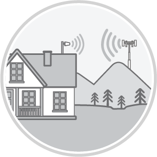 House with antenna transmitting signal to a cell tower on a mountain.