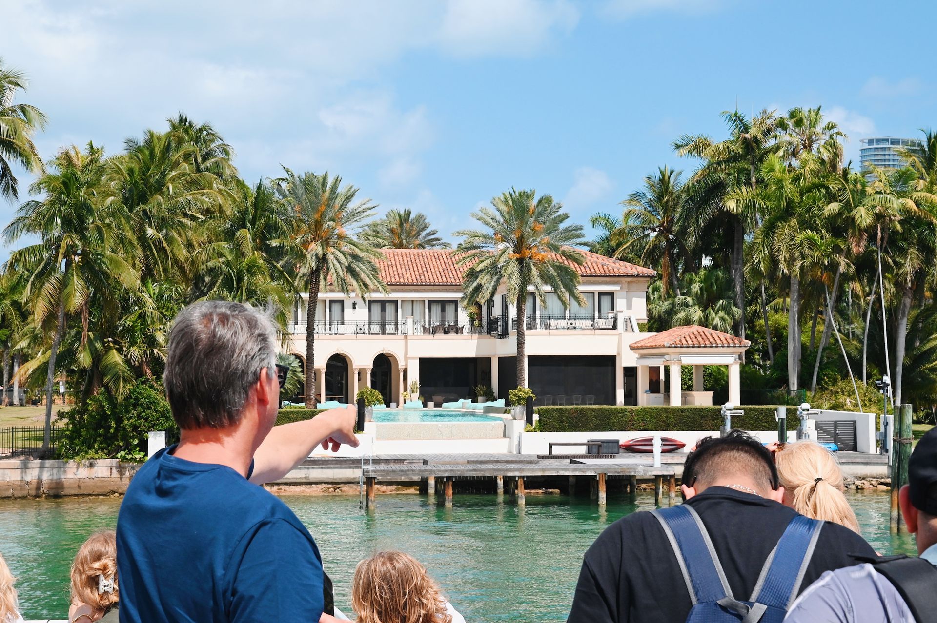 Miami Sightseeing Bayside Cruise passengers looking at the Celebrity Mansions
