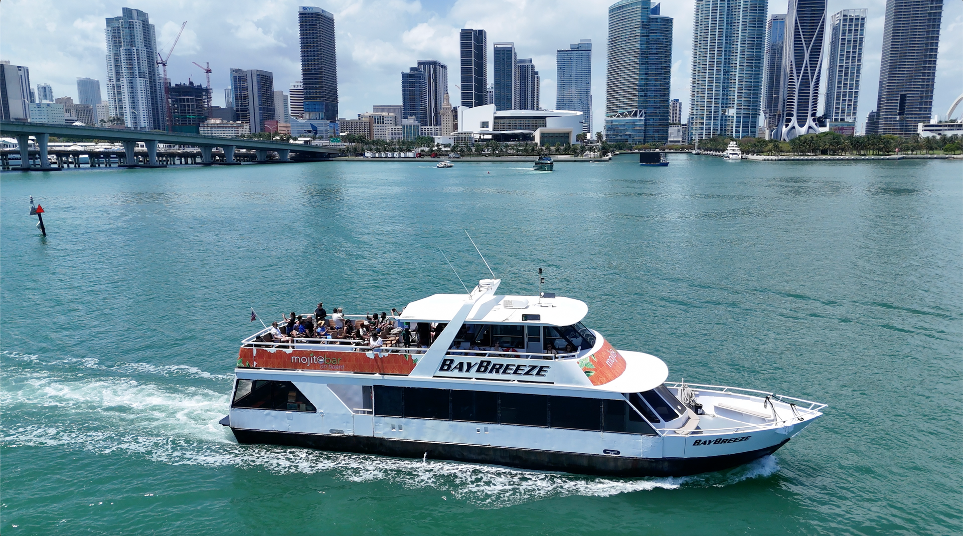 The Bay Breeze cruising through Biscayne Bay during a Miami sightseeing boat tour with skyline views