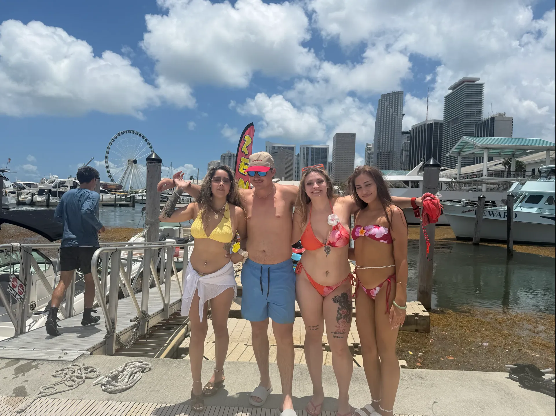 Happy guests preparing for a Miami Jet Ski Tour at Bayside Marketplace in Downtown Miami