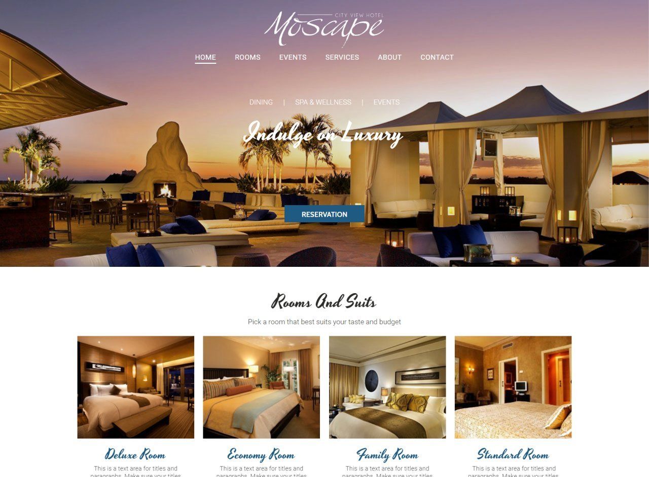 A website for a hotel with a sunset in the background.