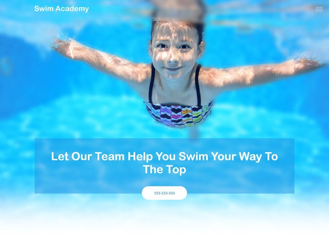 A girl is swimming underwater in a swimming pool.