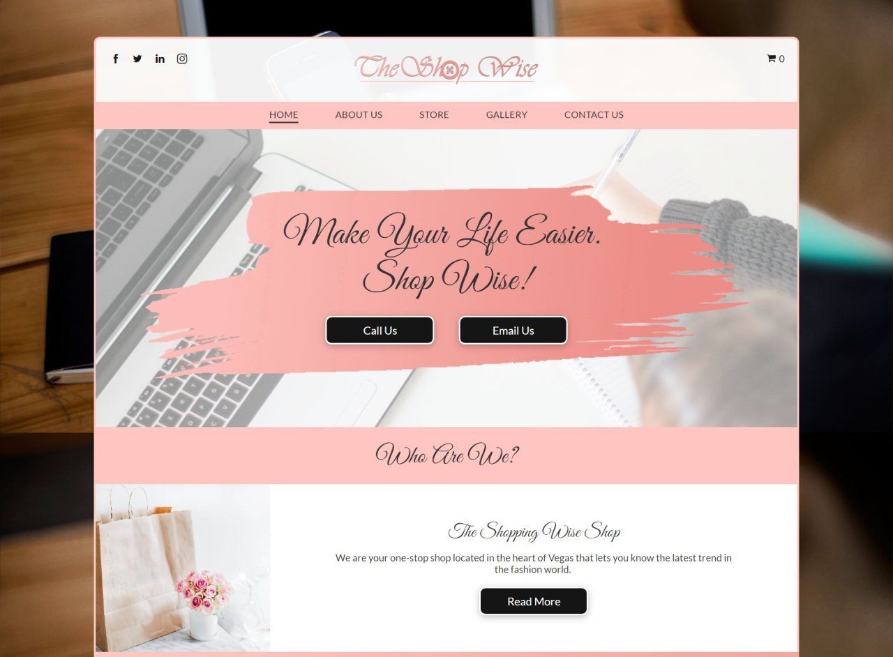 A screenshot of a website with a laptop on a desk.