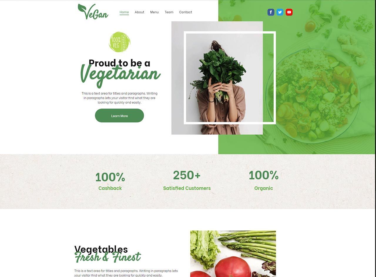 A woman is holding a bunch of vegetables in front of her face.