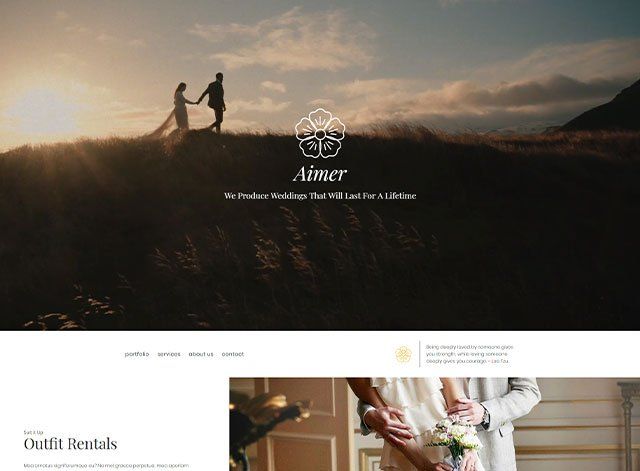 A bride and groom are standing on top of a hill holding hands.