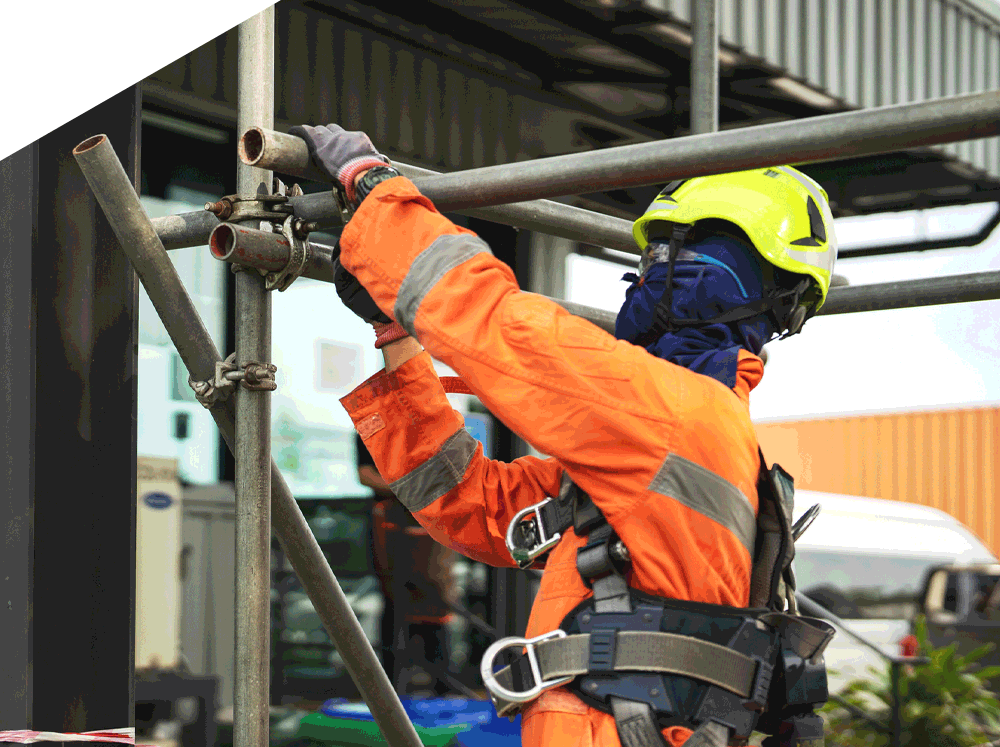 Man preparing and setting up scaffolding | Port Campbell, VIC | Southern Rigging & Scaffolding