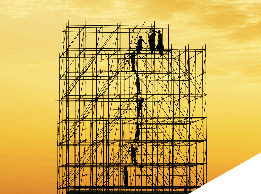 Workers in scaffolding with yellow background | Port Campbell, VIC | Southern Rigging & Scaffolding Workers in scaffolding with yellow background | Port Campbell, VIC | Southern Rigging & Scaffolding