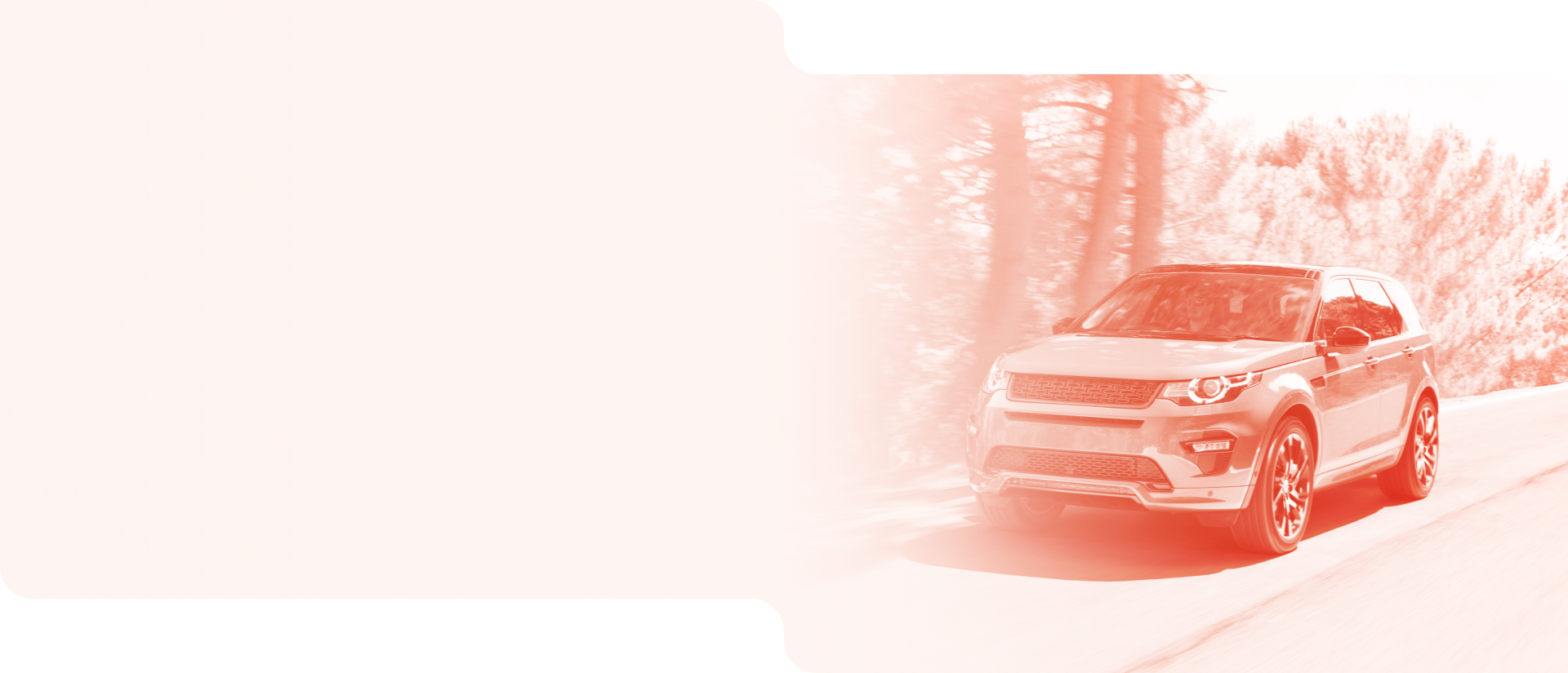 Red car driving on a snowy road with a pale pink winter background