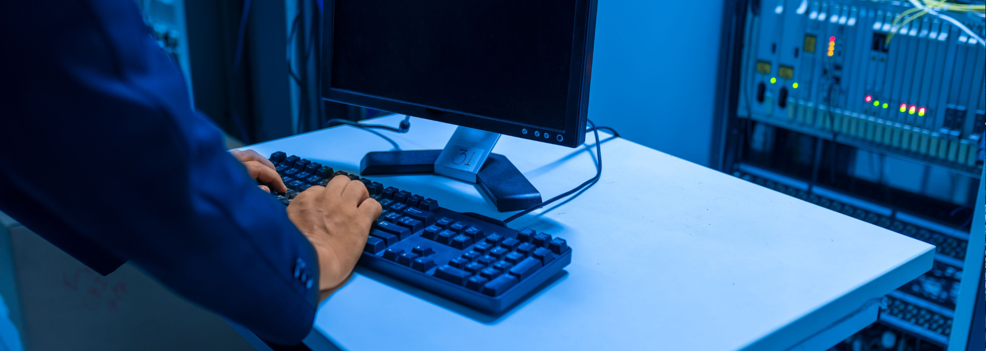 Technician working in a data centre. 
