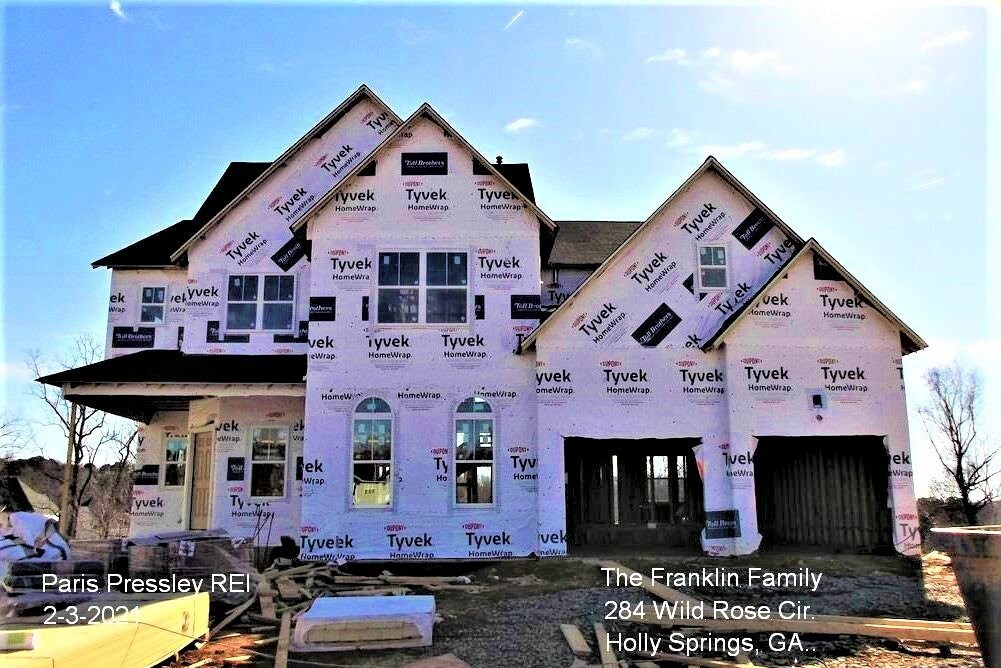 A house is being built in holy strings , ga