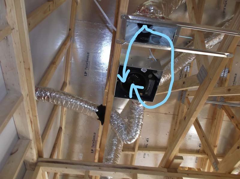 A picture of a ceiling with arrows pointing to a duct.