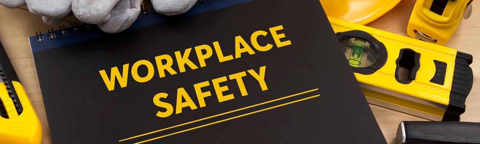A black sign with the yellow text 