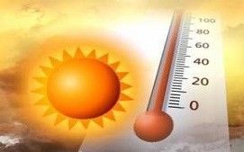 A bright sun in a hazy orange sky next to a thermometer indicating a high temperature.
