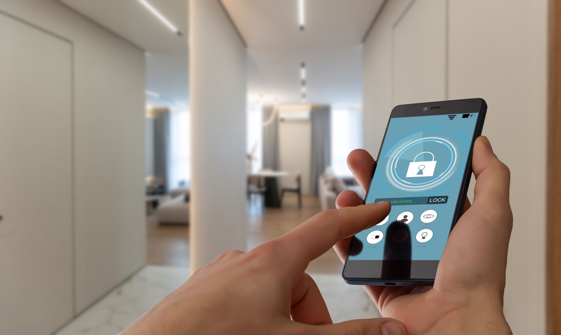 Hand holding smartphone with smart home app in a bright hallway