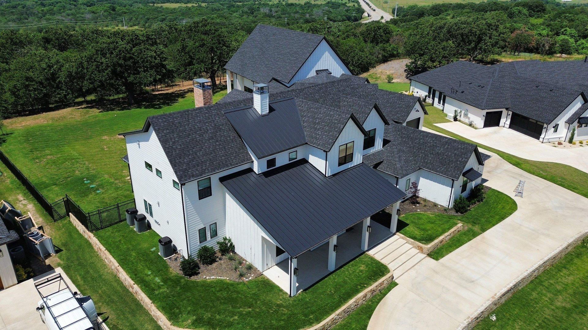 An aerial view of a house that has been damaged by a fire.