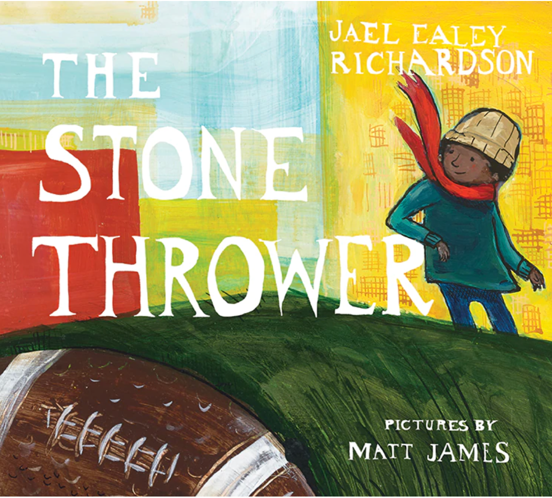 Book cover: Child in red scarf on green hill; football in front, title 