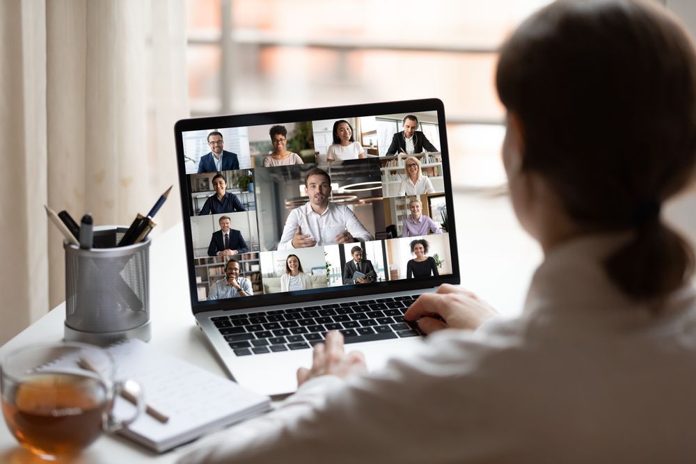 Person in a Home Office Joining a Video Conference — Pacific Telephone & Data In Lake Macquarie, NSW
