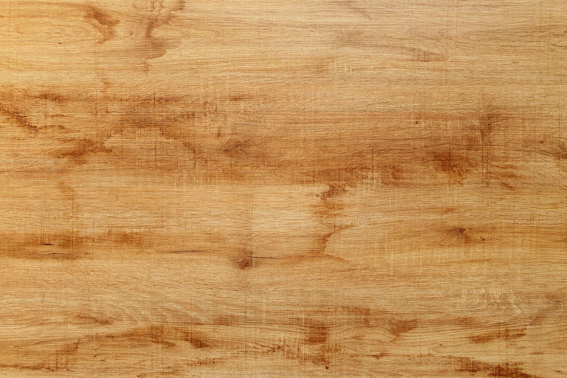 A close up of a piece of wood showing the texture of the wood.
