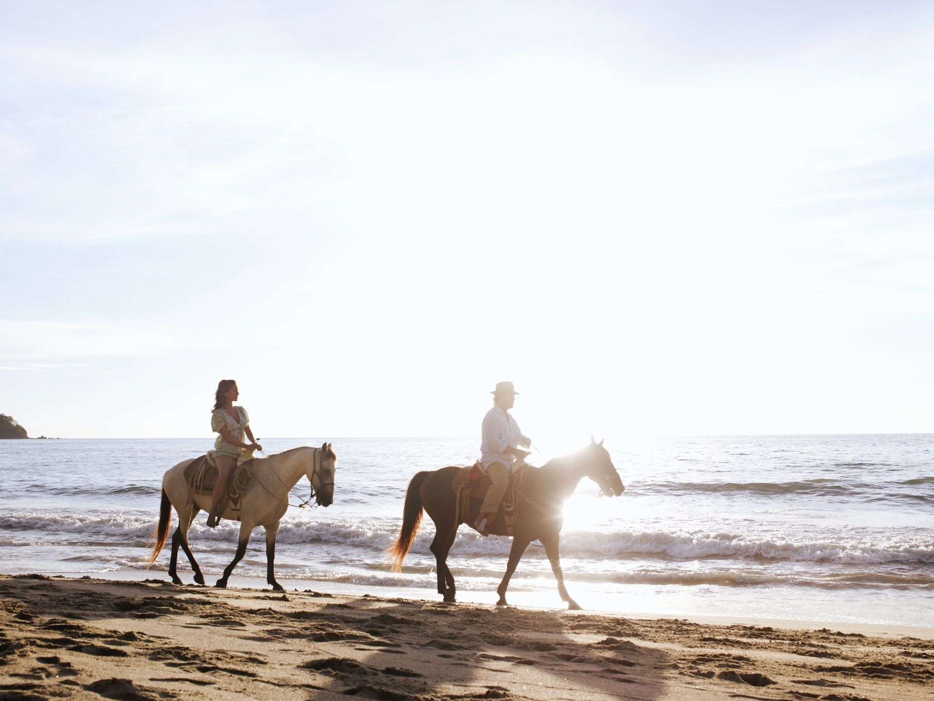 couple horseback riding