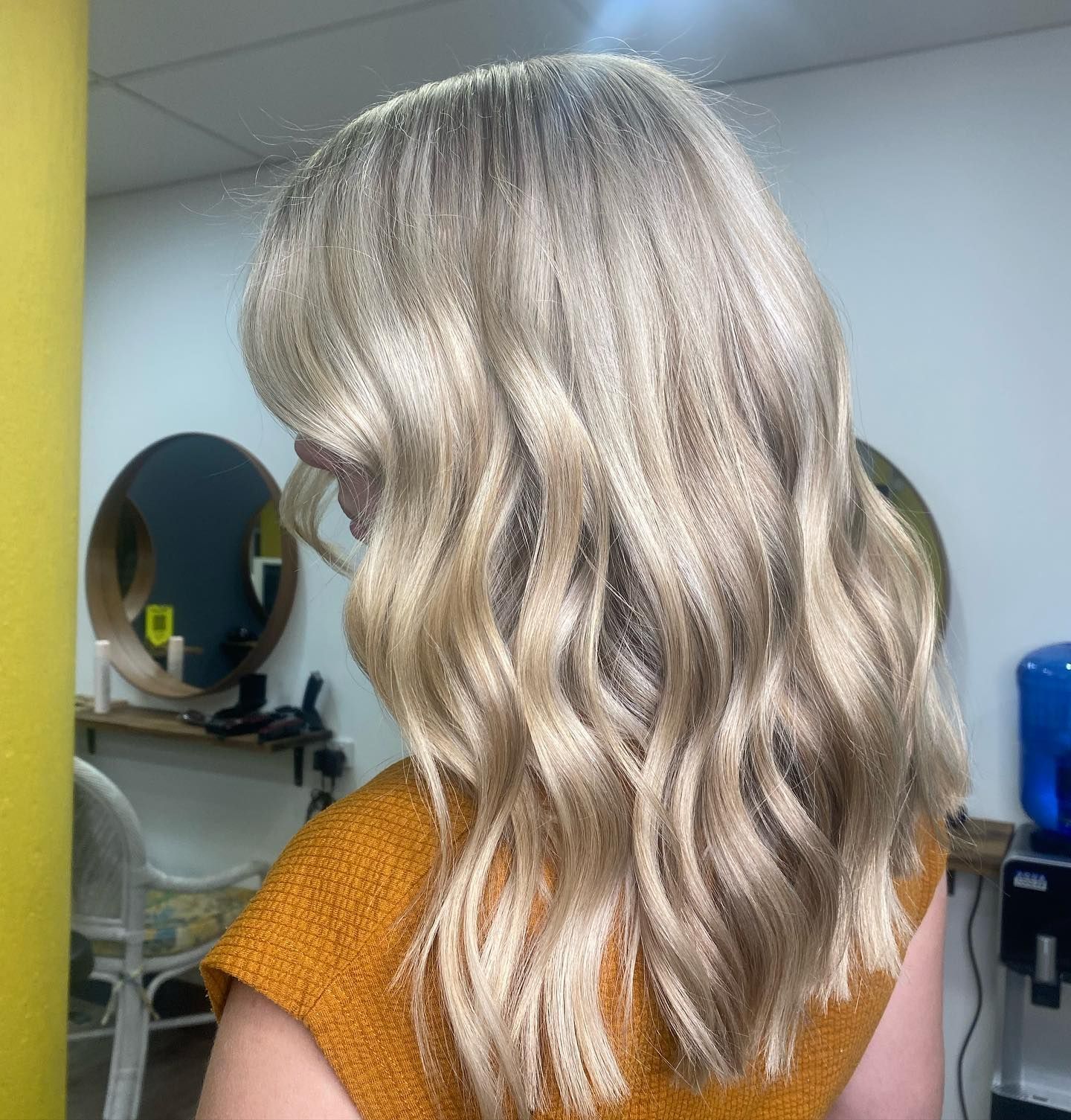 Wavy Platinum-blonde Hair Styled To Shoulder Length In A Salon Setting — Oh So Blonde Hair Studio in Kawana, QLD