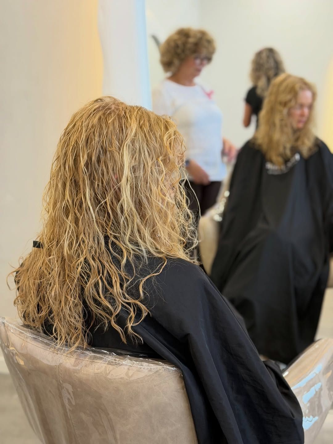 Hairdresser On The Sunshine Coast Styling Long Wavy Hair